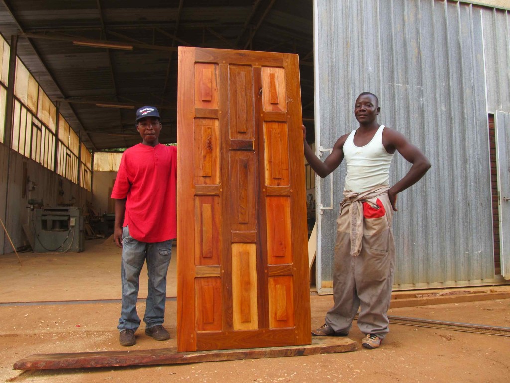 Bannet and Sinosi showing off the door