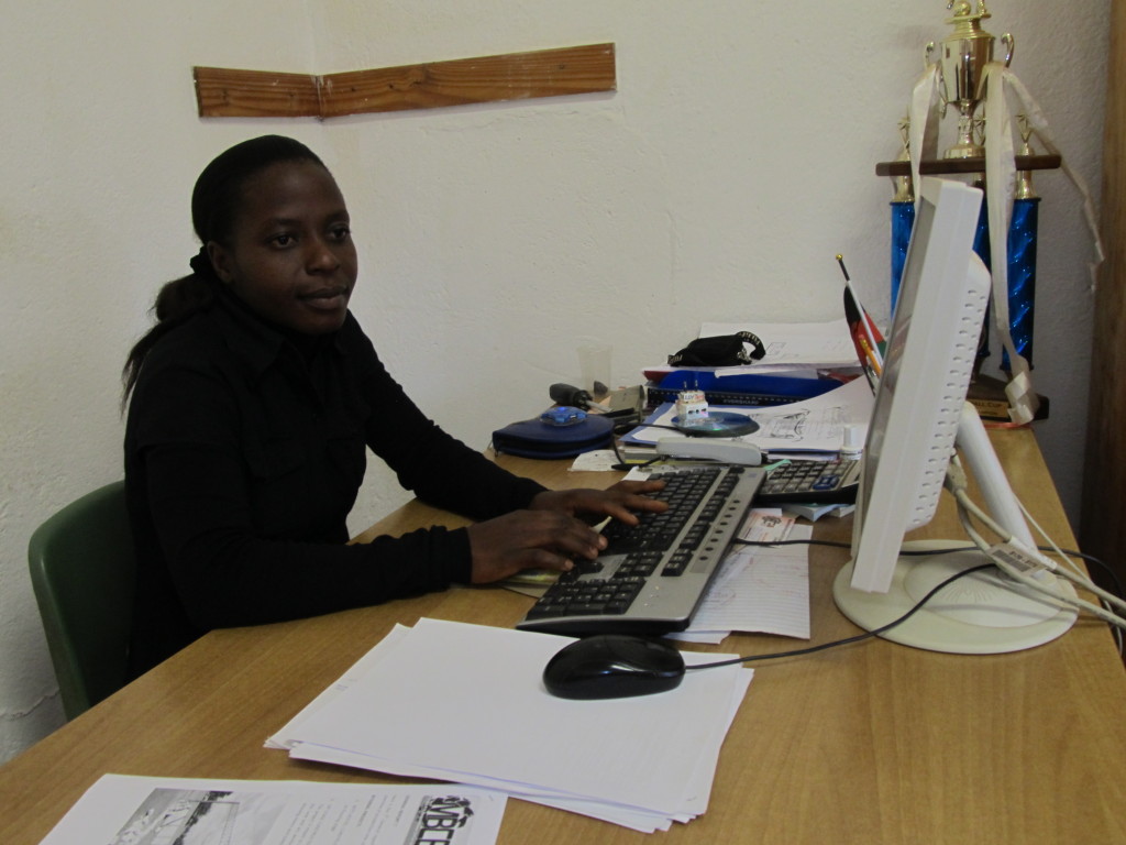 Loyce Phuka on her desk