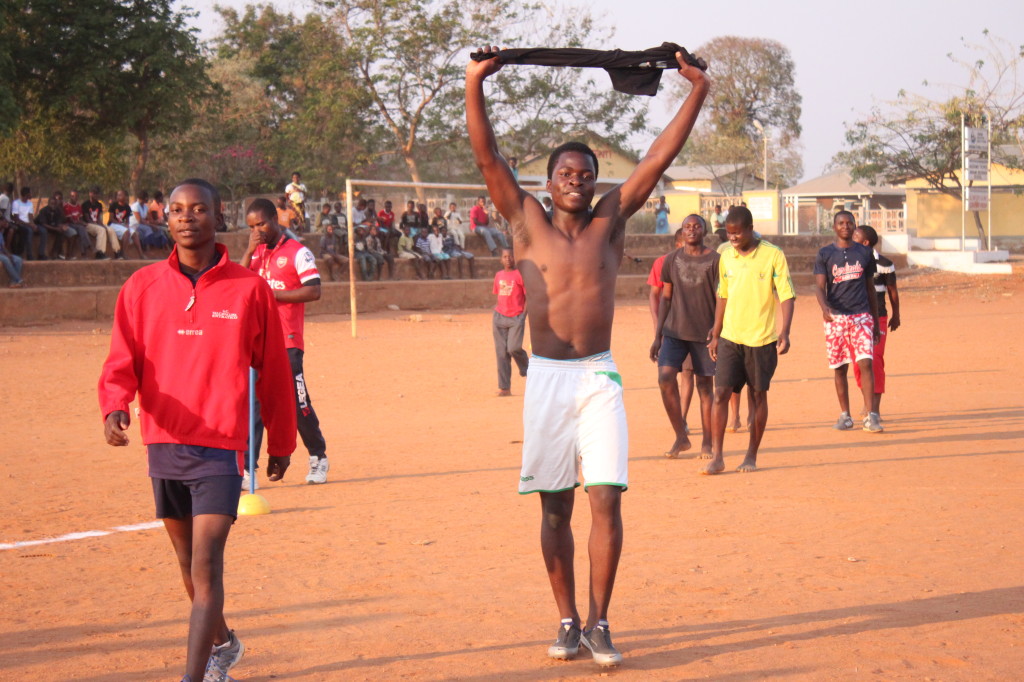 Gift Chikuse waving his shirt after winning during racing