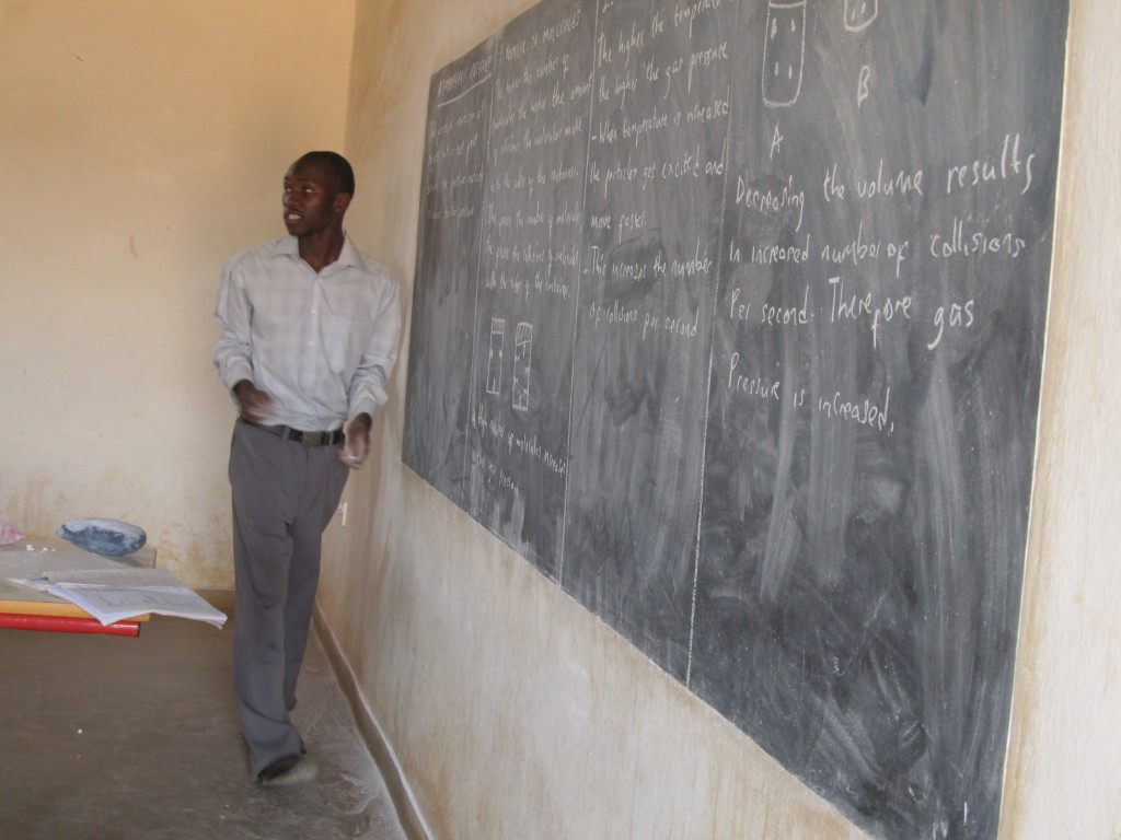 Mr. I. Chilima in front of class