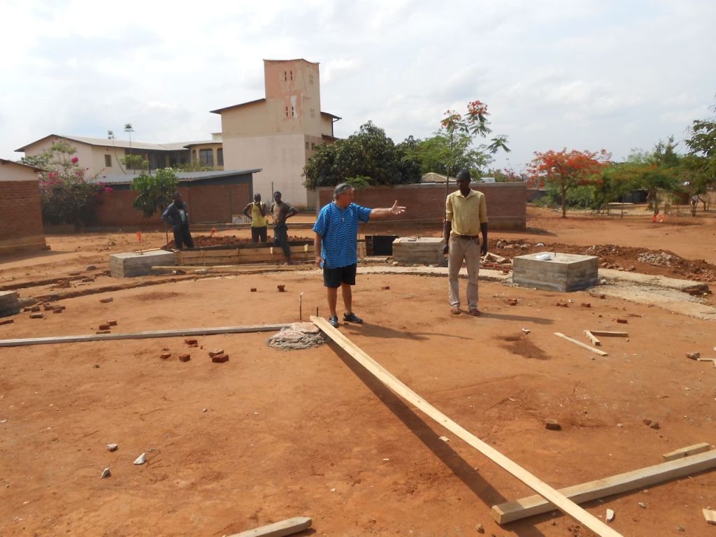 Inspecting the foundation of Andrea Woyera Chapel 